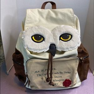 Mr H. Potter Owl backpack with draw string and magnet flap. Pre owned like new